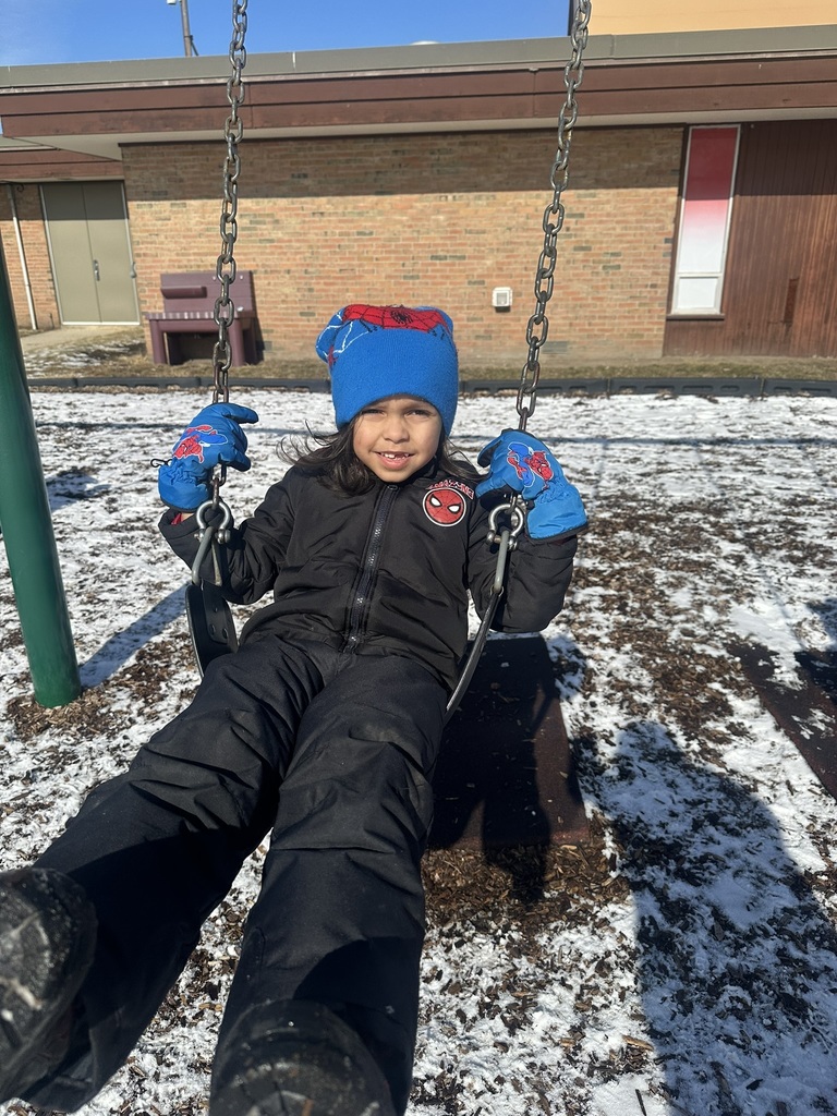 Child swinging on swing