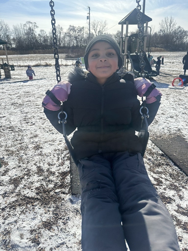 Child swinging on swing