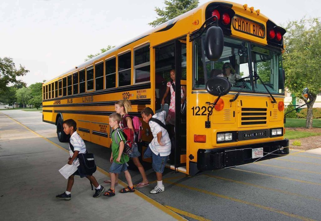 Remind children to look both ways before stepping off bus.