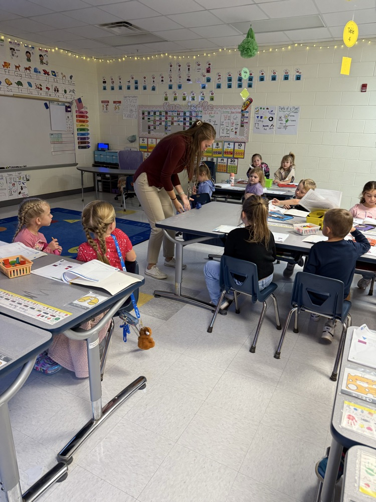 images of students doing work in K
