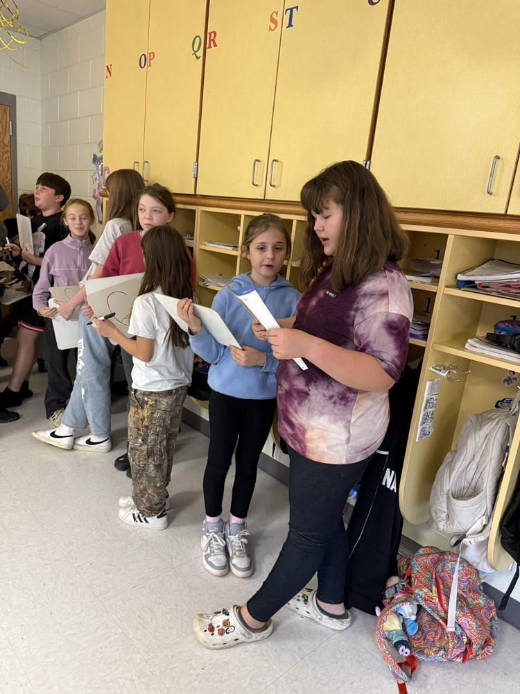 images of students doing work in math groups