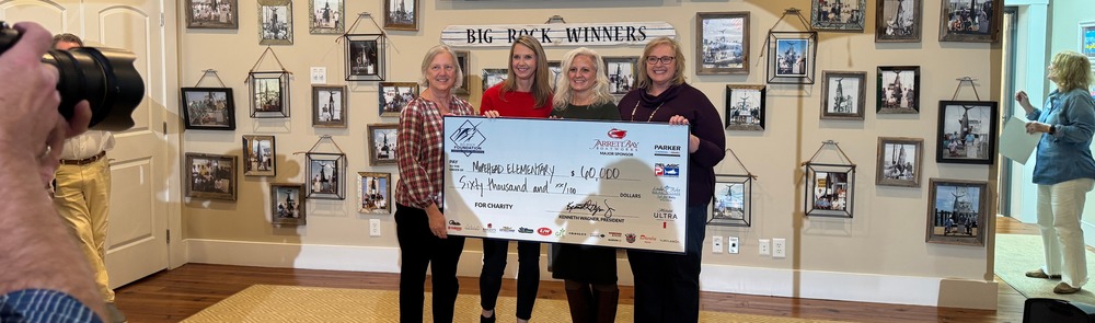 Photograph of Big Rock Foundation Grant winners Susan Merrell, Christy Propst, and Kelly Riley accepting a $60,000 check!