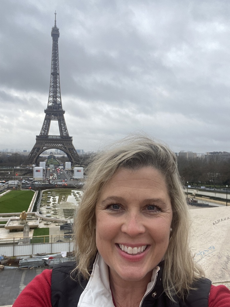 Mrs. Palmer with the Eiffel Tower