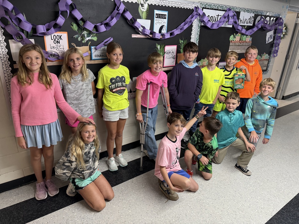 Pictures of MCES students and staff wearing neon clothing for Red Ribbon Week's Spirit Day