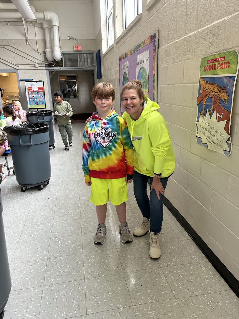 Pictures of MCES students and staff wearing neon clothing for Red Ribbon Week's Spirit Day