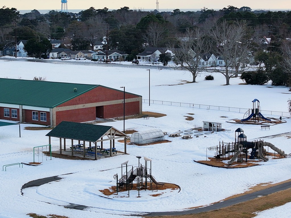 Photo of Beaufort Elementary School. The grounds are covered in snow. 