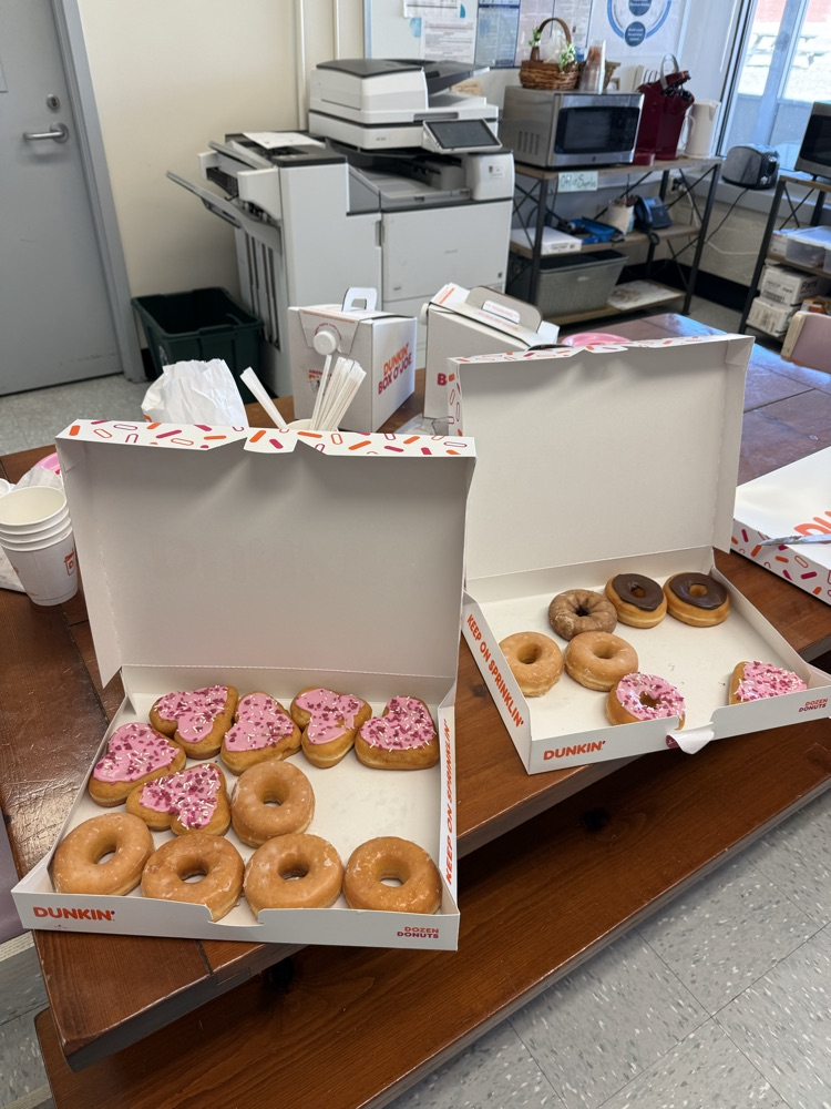 A picture of donuts and coffee in the teacher’s lounge