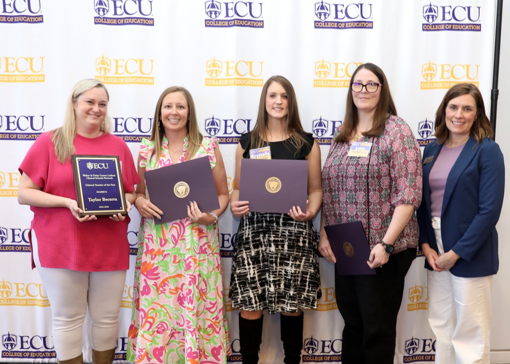 Award for Ms. DeRosia with group