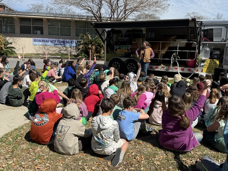 Pictures of students during the mobile dairy classroom presentation 