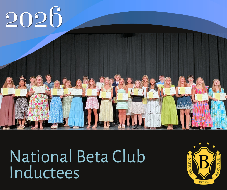 The 2026 National Beta Club Inductees stand on stage after their induction holding certificates.