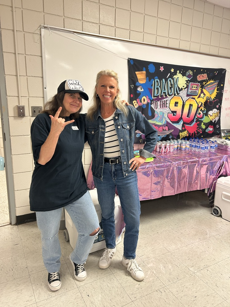 teacher dressed in 90s attire