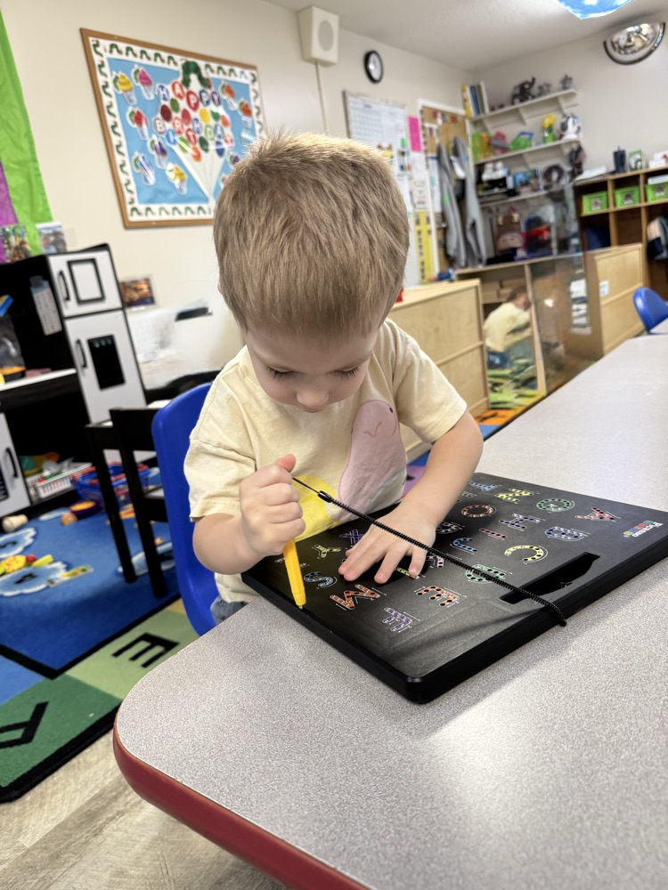 child writing 