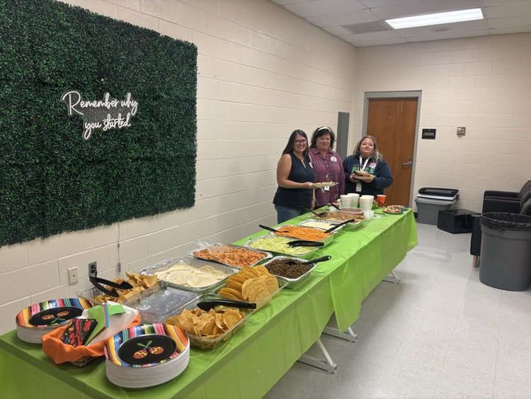 staff eating taco bar