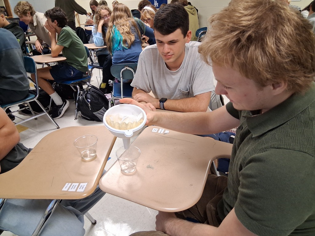 Sylas and Anderson work on filtering saltwater