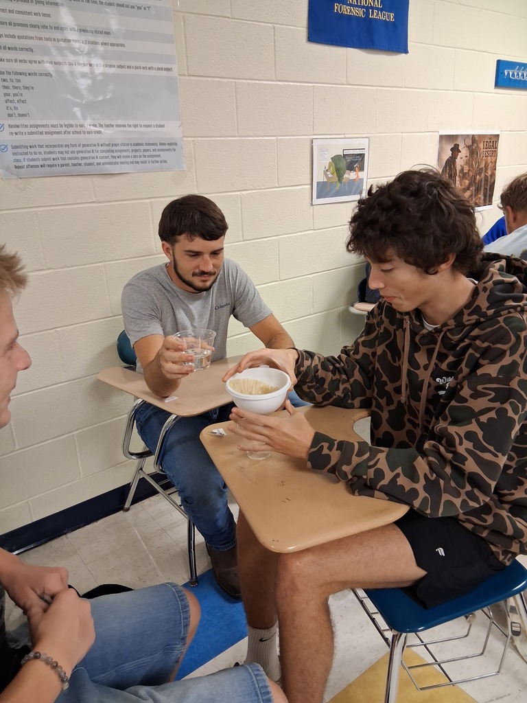 Thomas and Mac work on the project
