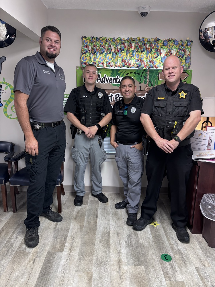 group of four police officers 