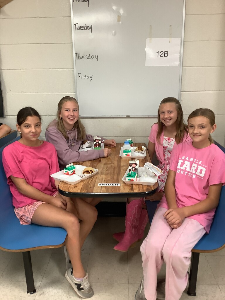 Four girls in pink