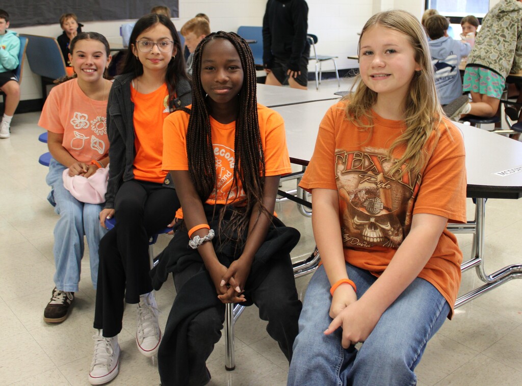 Students wearing orange