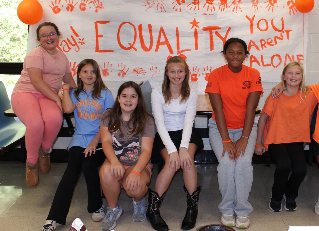 Students wearing orange