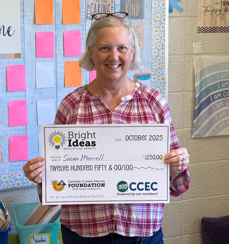 Picture of Mrs. Susan Merrell with her Bright Ideas Grant check