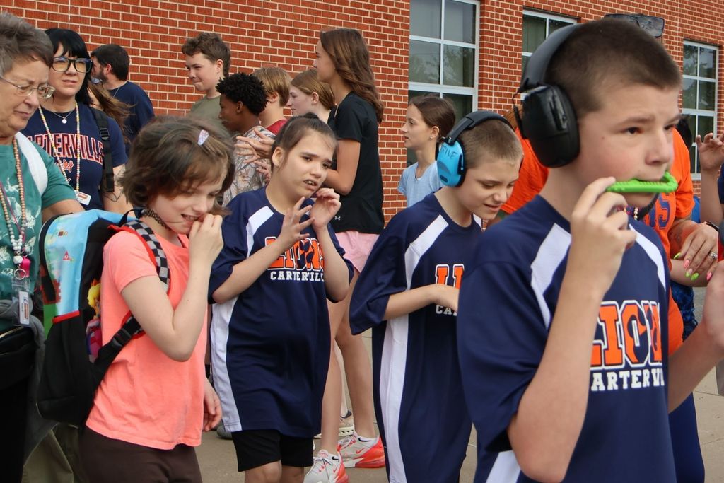 Athletes getting on the bus