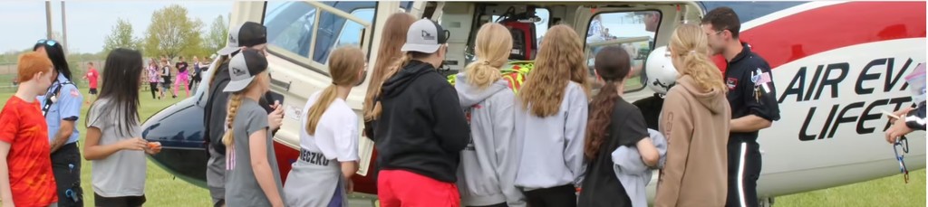 Students viewing an Air Evacuation helicopter