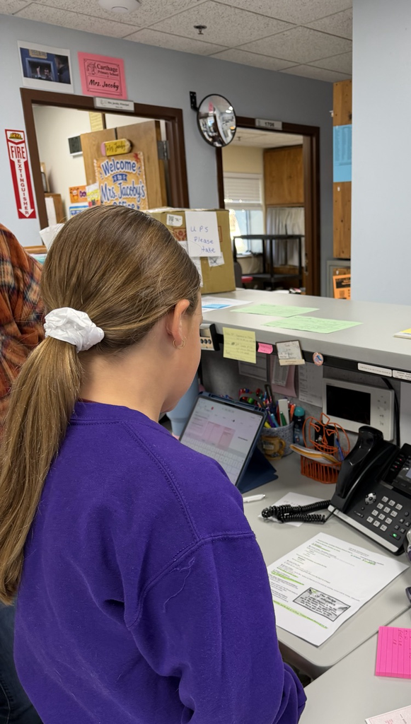student reading morning announcements