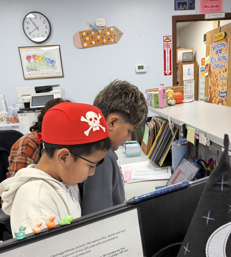 students reading announcements
