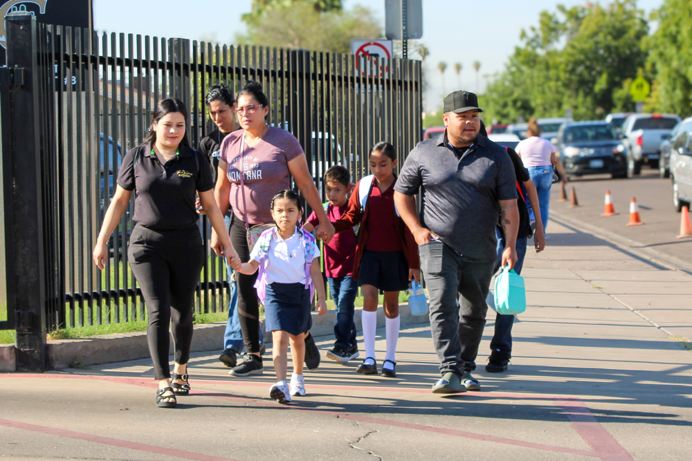 parents dropping their children off at school