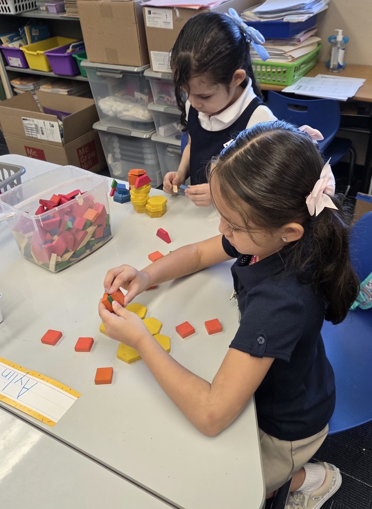 Kindergarten students working in centers.