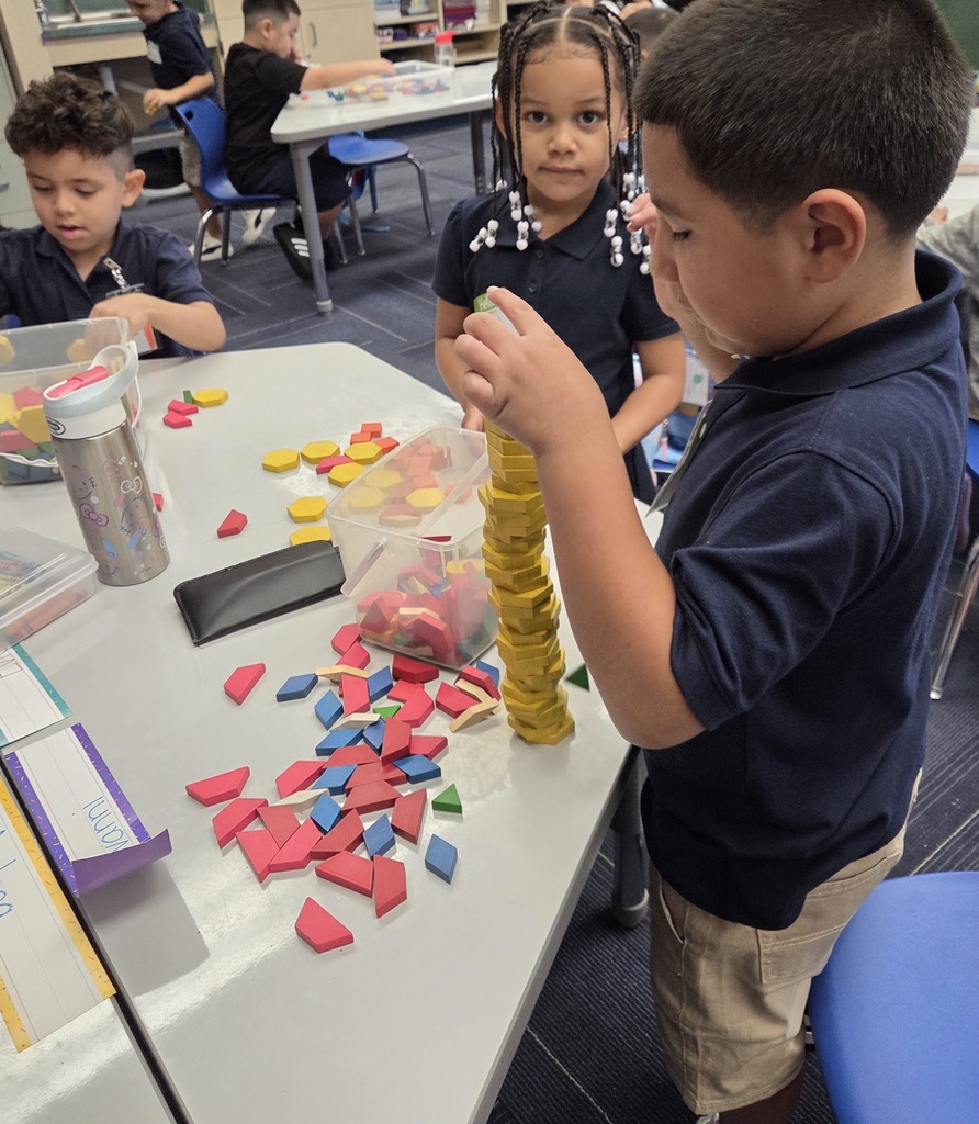 Kindergarten students working in centers.