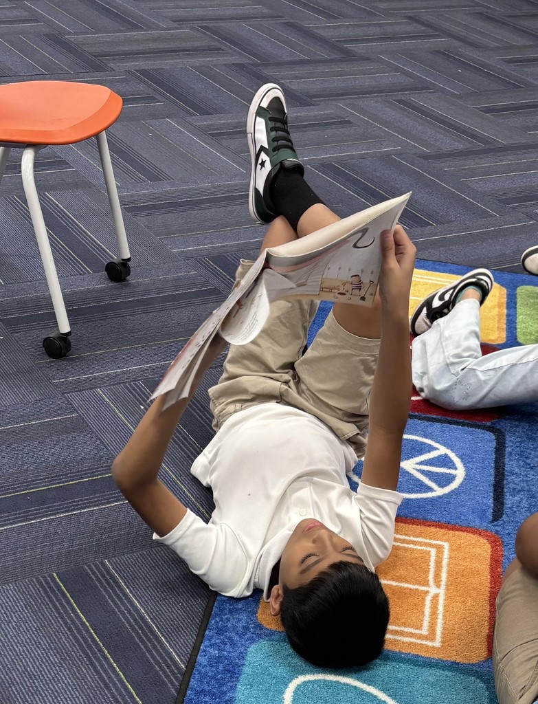 student reading book