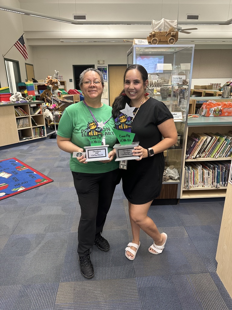 ESP on the month (left) and teacher of the month (right) holding awards
