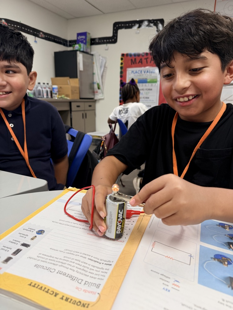 a battery, a cable, and a light bulb