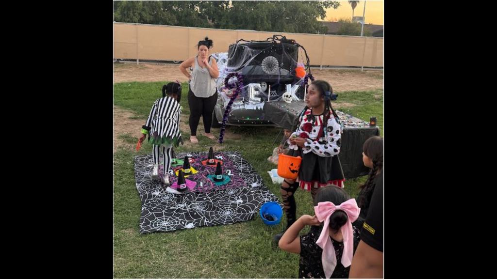 Eek Trunk with witch hat ring toss in front