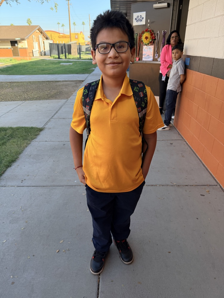 student wearing yellow