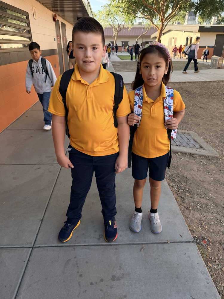 students wearing yellow