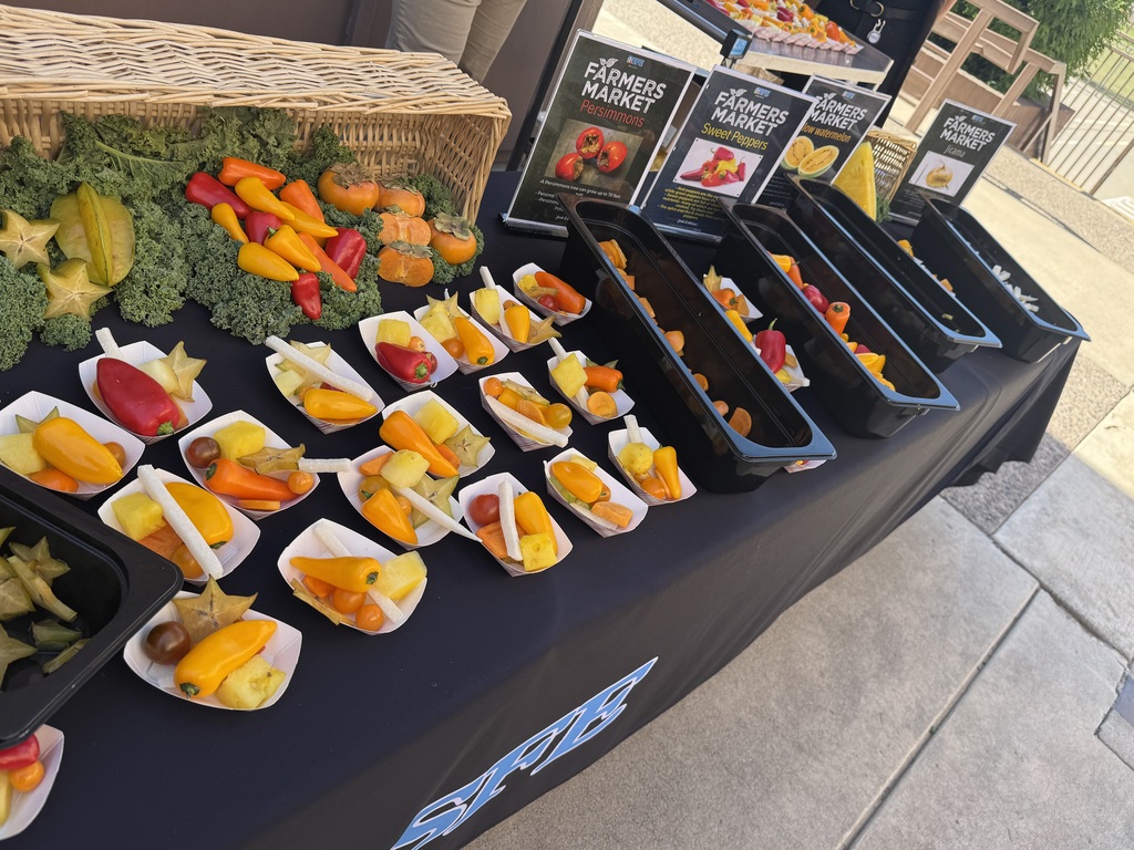Table full of plates with mixed veggies