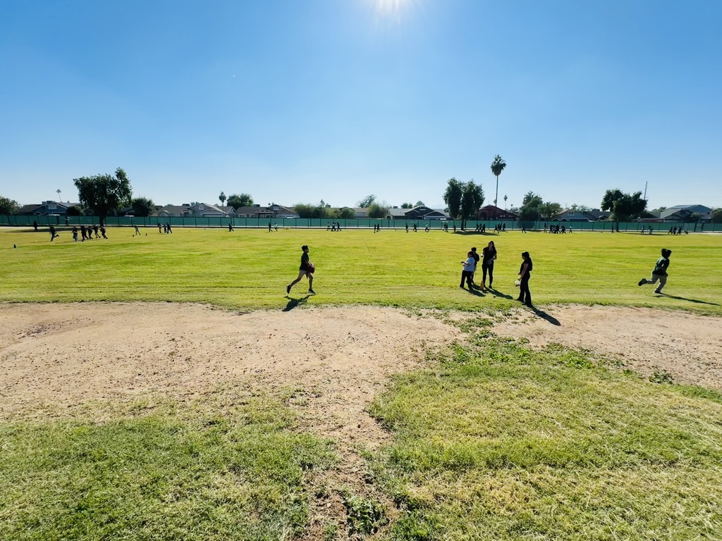 students running on field 