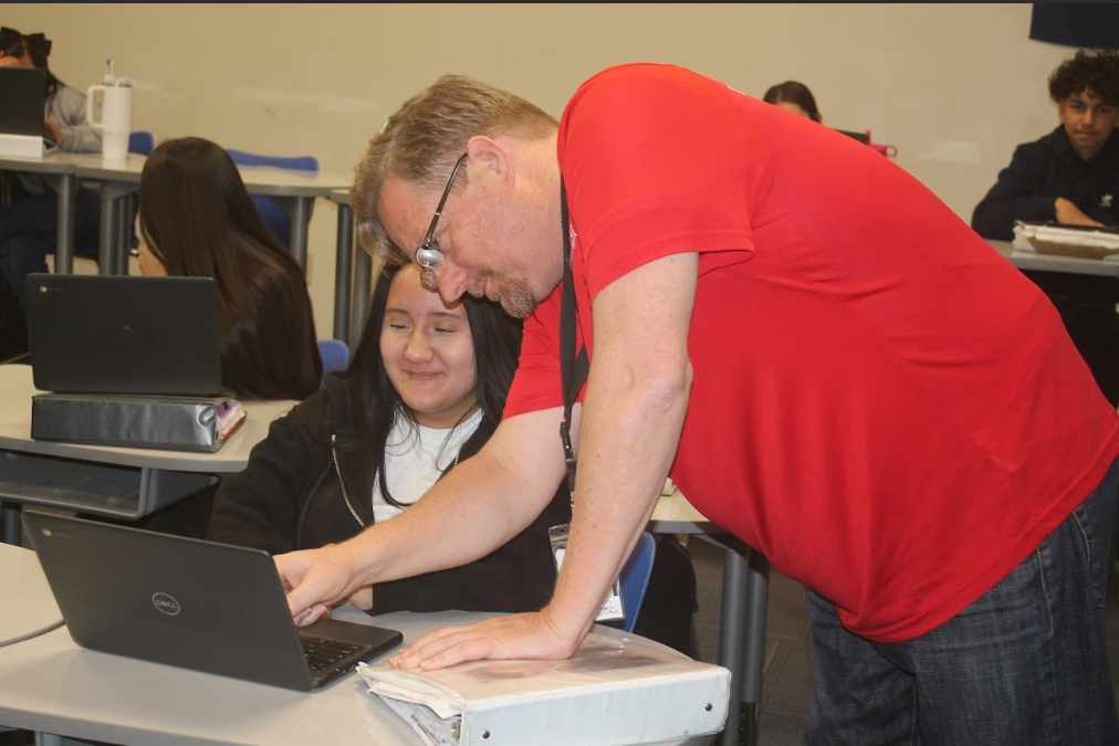 7th grade students in ELA, Science, Math, and Social Studies classrooms actively participating in hands-on and multimedia lessons while teachers guide instruction.