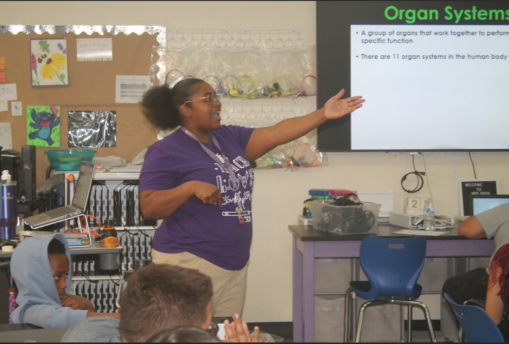 7th grade students in ELA, Science, Math, and Social Studies classrooms actively participating in hands-on and multimedia lessons while teachers guide instruction.