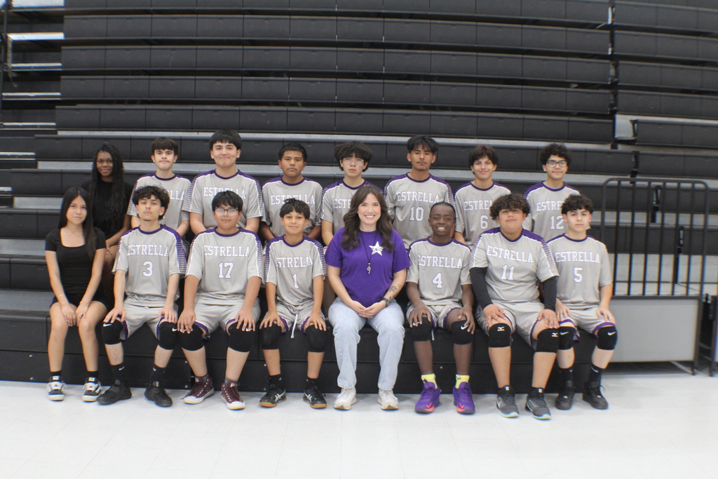 Estrella boys volleyball team, coach, and managers.