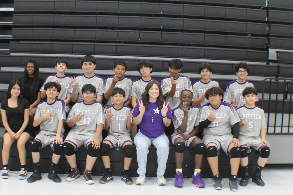Estrella boys volleyball team, coach, and managers.