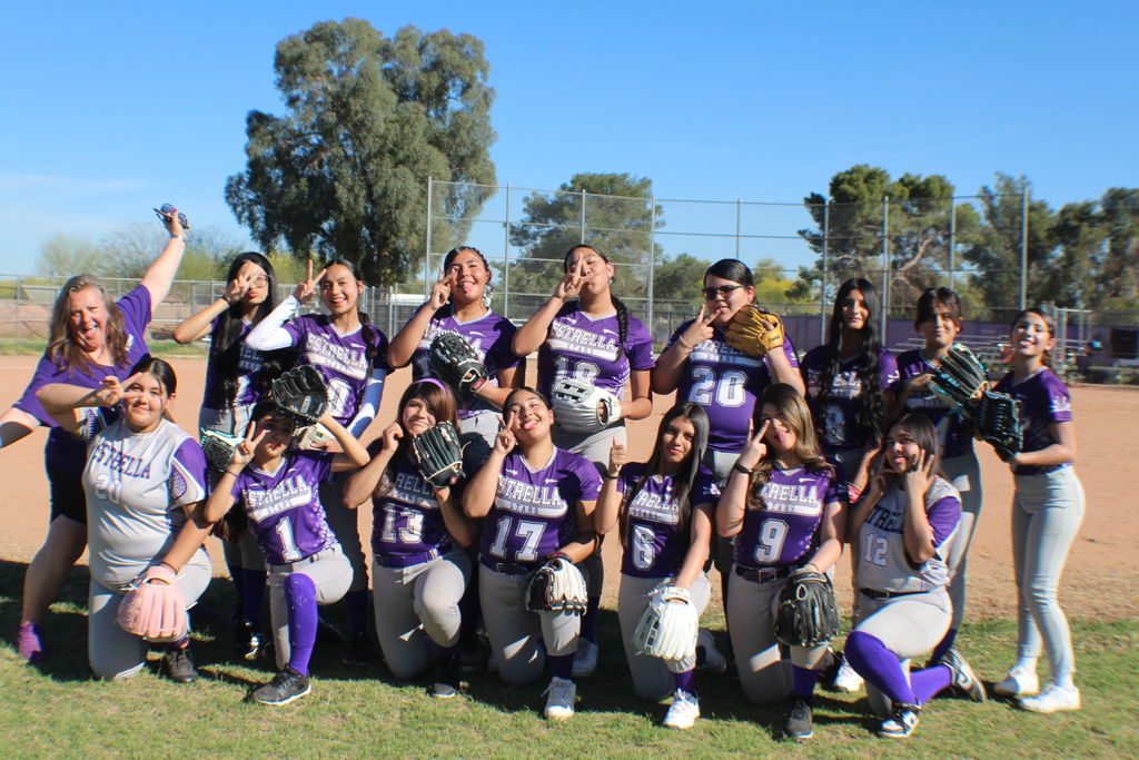 Softball team and coach
