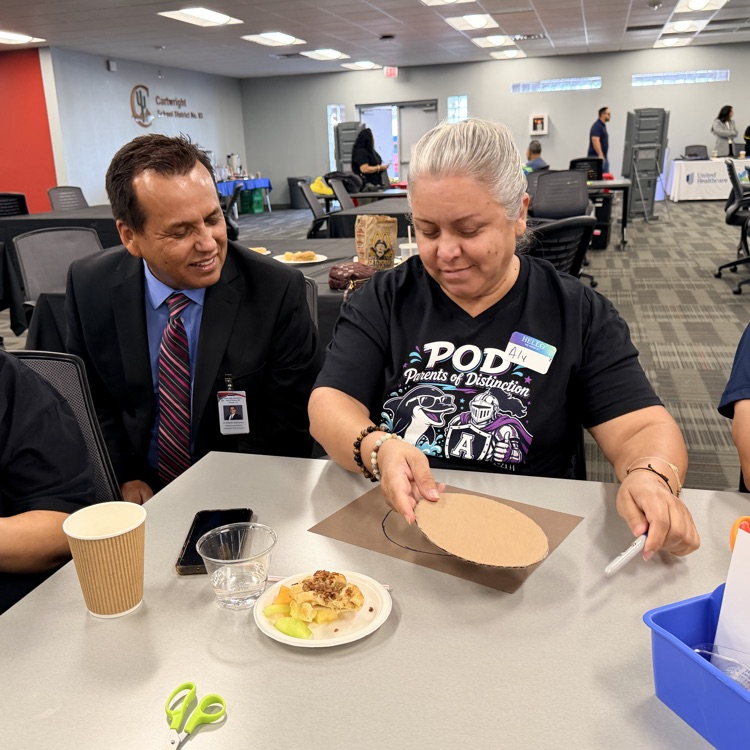 superintendent in a meeting with parents