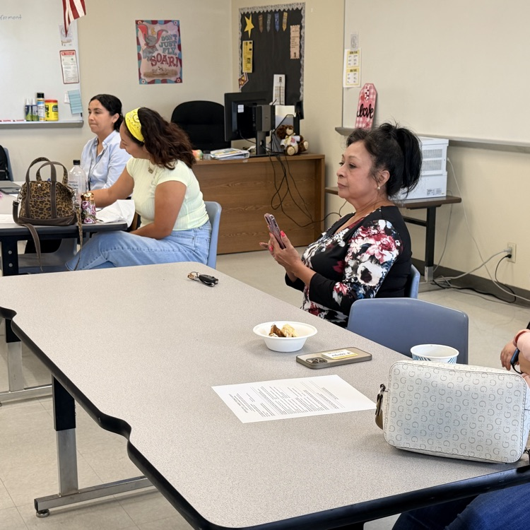 parents at a meeting