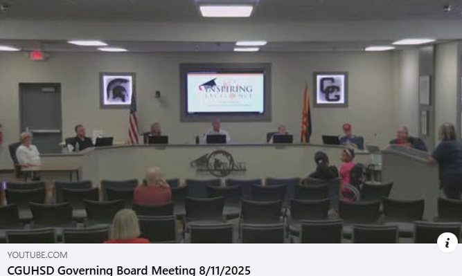 Governing Board members sitting at a Governing Board meeting