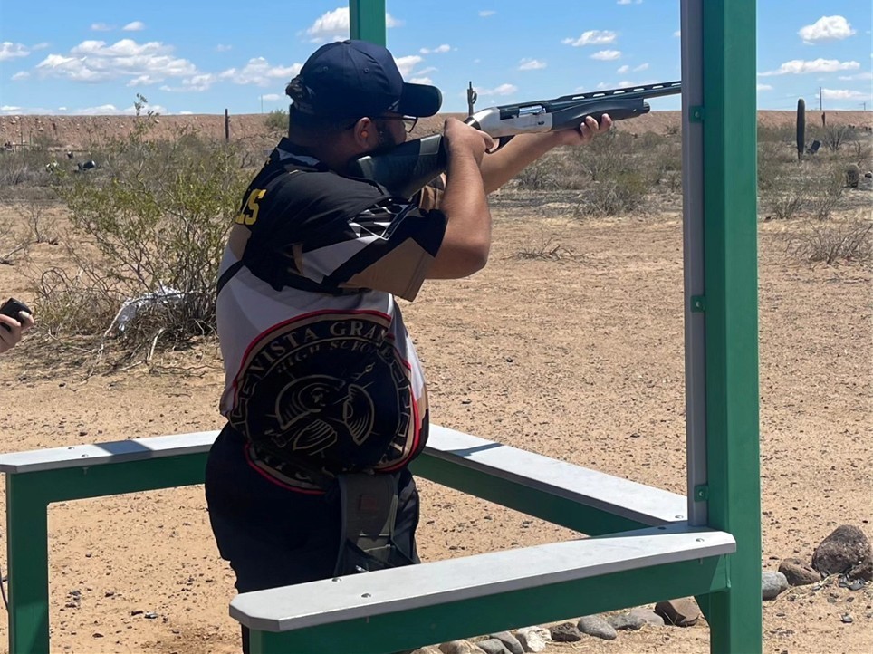 Ramon Gonzales shooting a gun