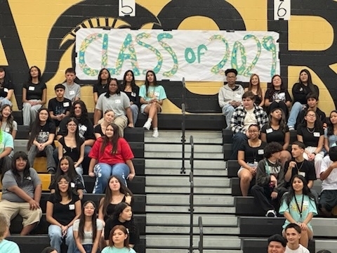 Freshmen sitting in the bleechers @ Freshman First Days with a poster saying "Class of 2029"