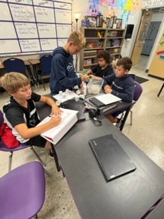 Students completing a design challenge